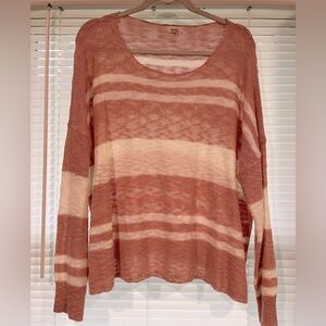 Oversized striped coral sweater.